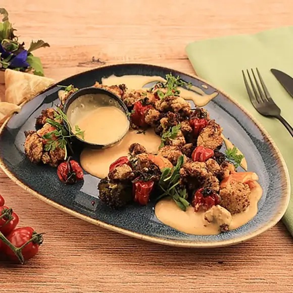 Veganes Blumenkohl-Popcorn mit Opflanzda